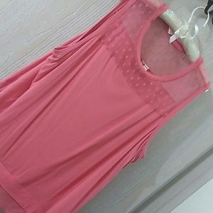 Pink tank top with sheer neckline, tiered bottom